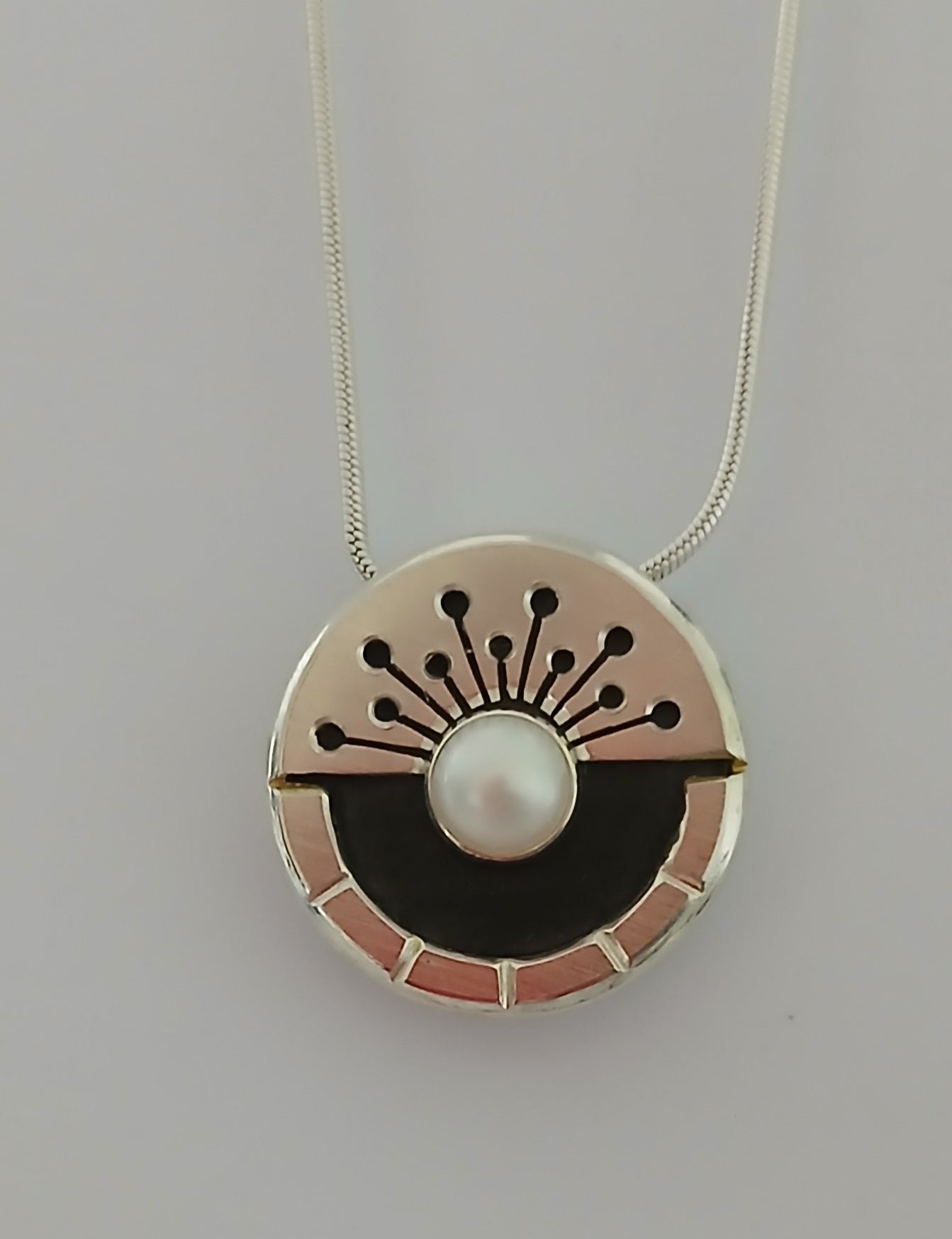 Silver and Ebony "Millennium" Pendant set with Pearl.