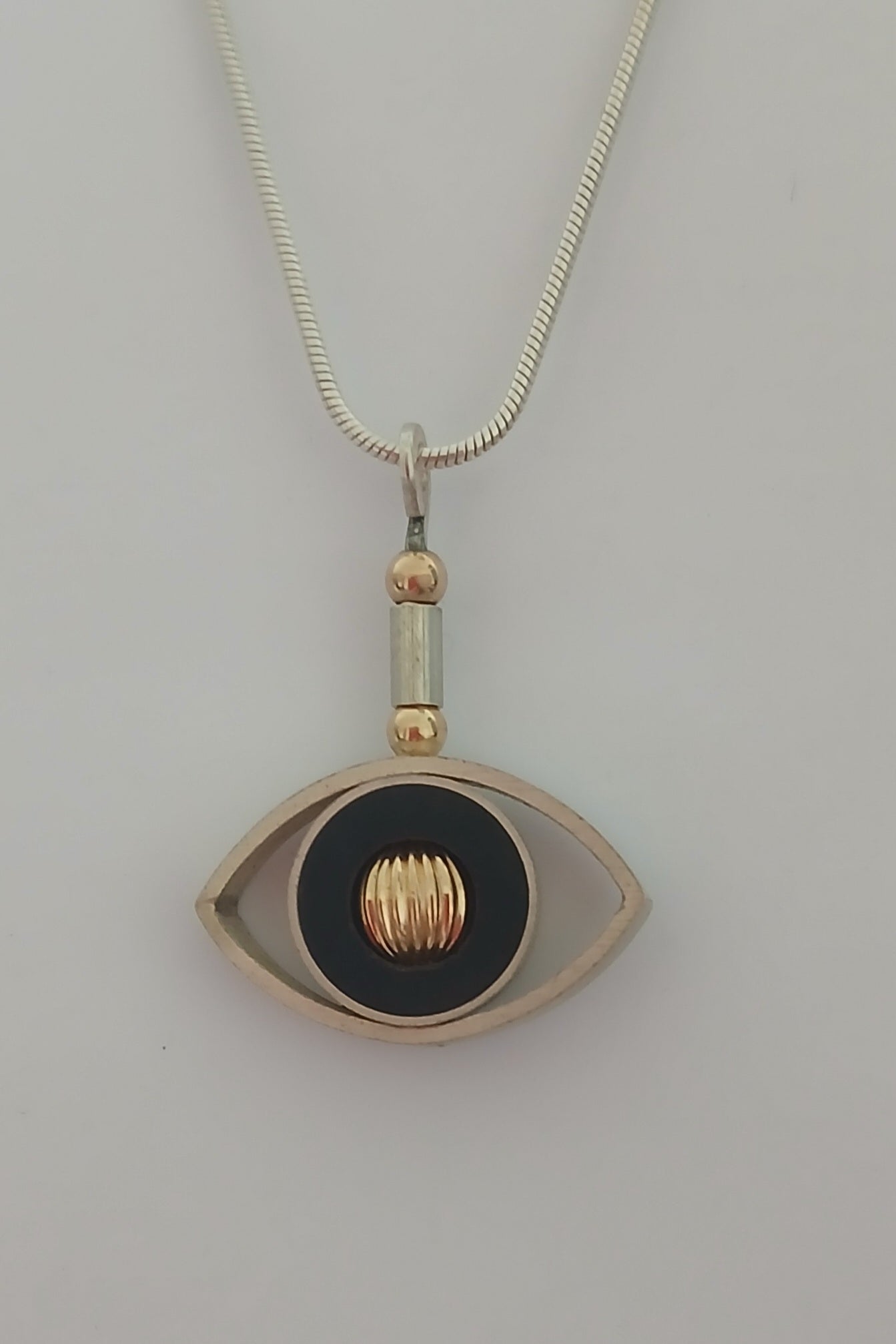 Silver, Ebony and Gold Reversible "Eye" Pendant