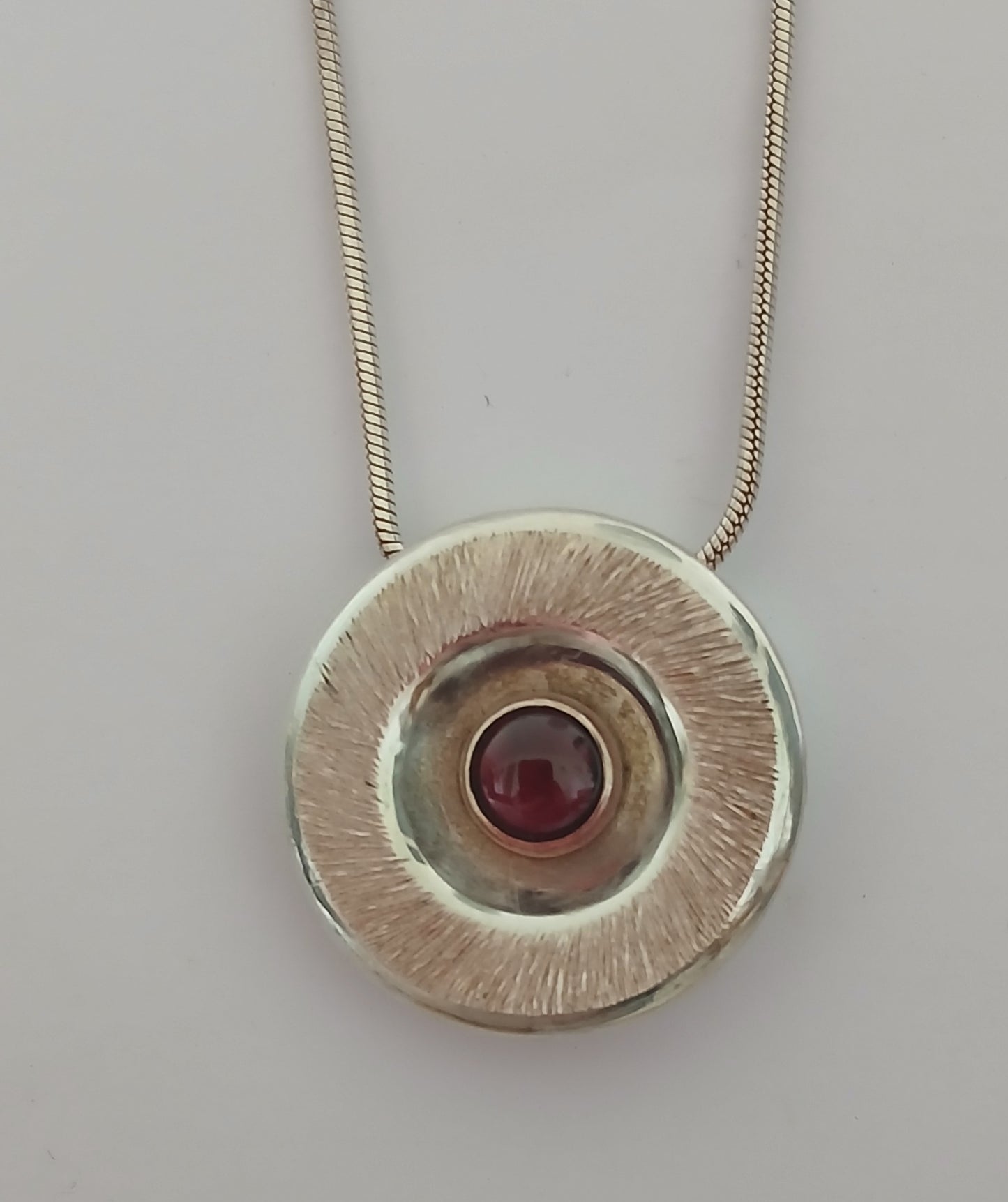 Silver Round Pendant with Garnet