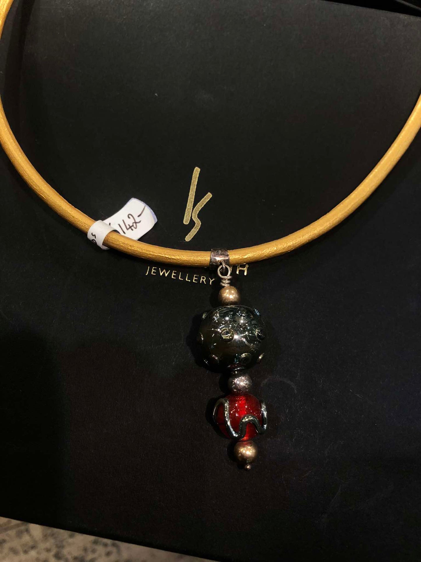 Yellow Leather Torc w/ Stg. Silver Clasp, 14ct Gold filled bead, and Red, Deep Green Beads