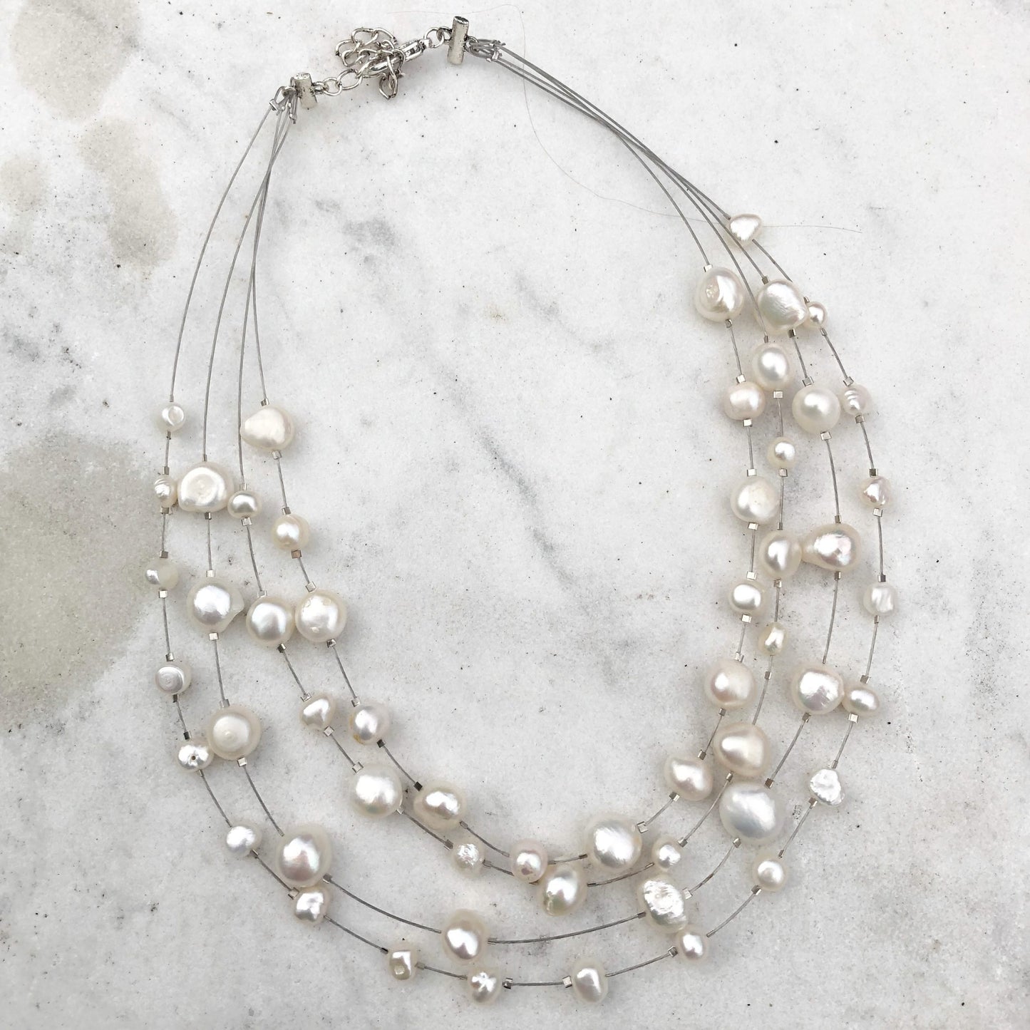 4 Strands of Spaced Real Pearls