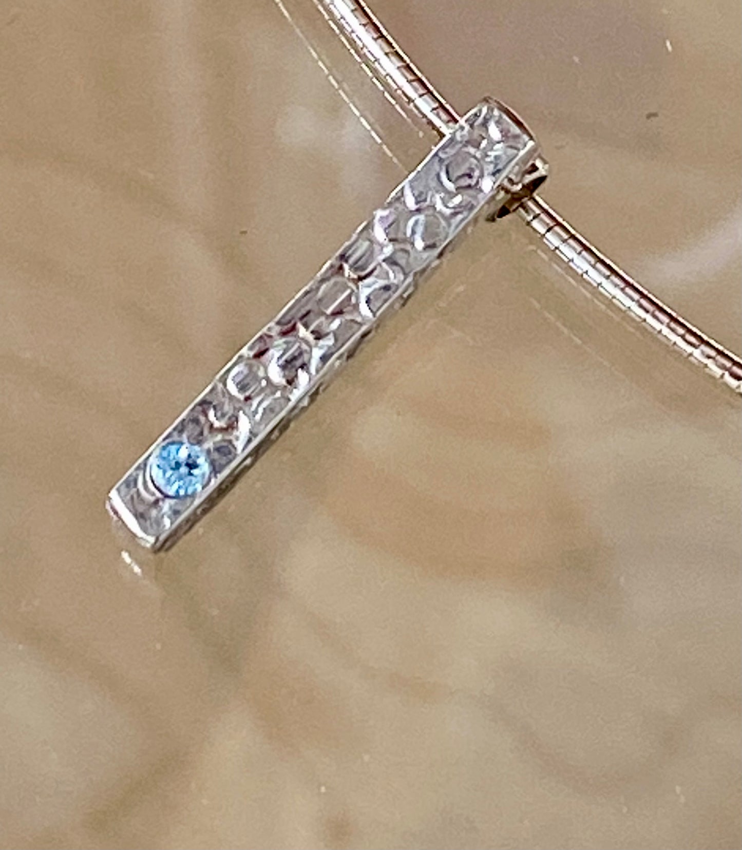 Topaz Stem Pendant.