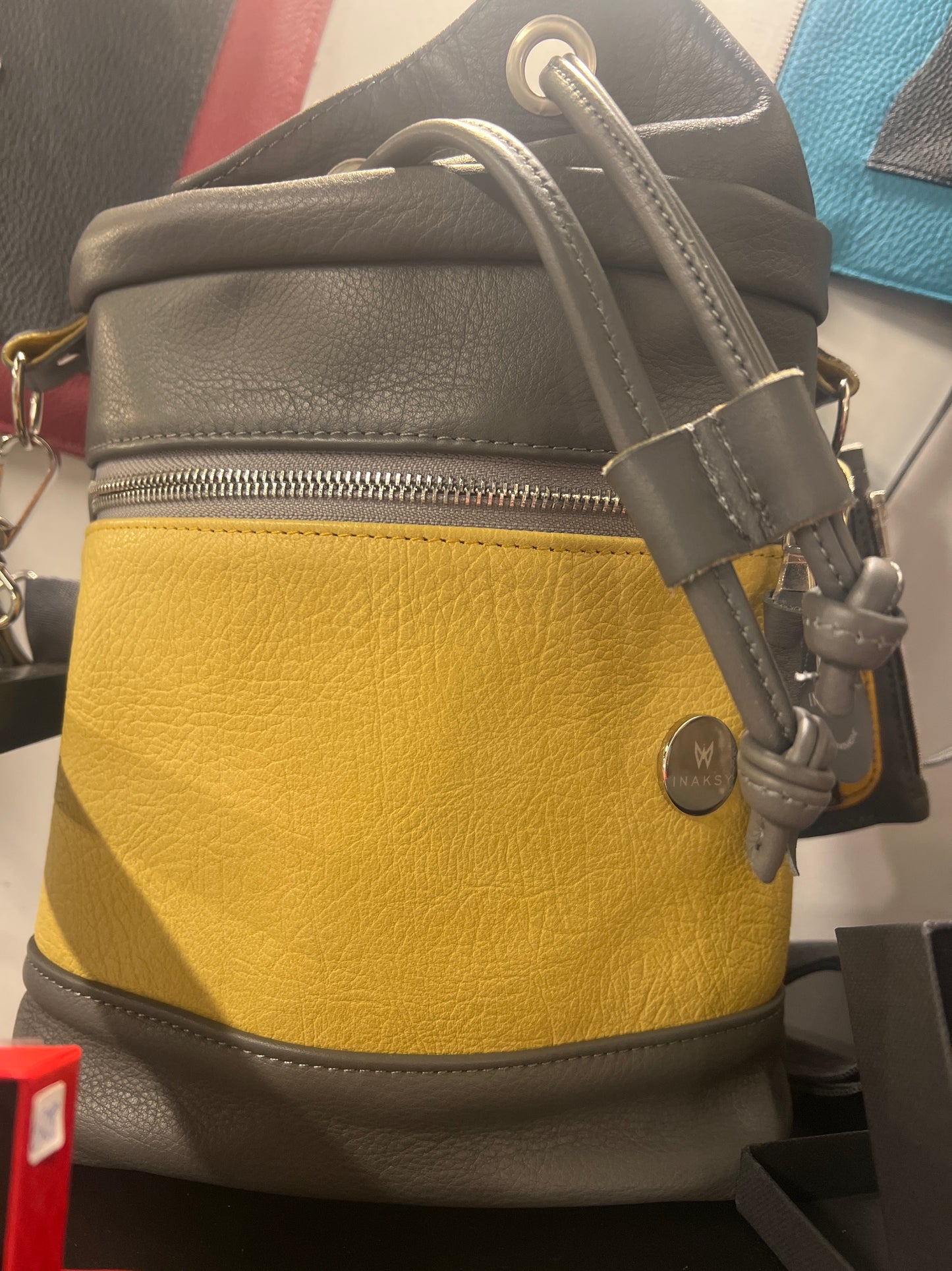 Grey yellow bucket bag