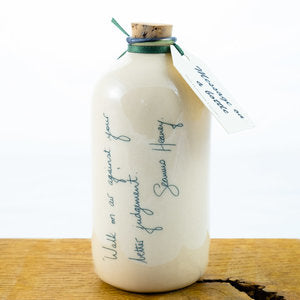 Message on a bottle 'Walk on air against your better judgement' - Seamus Heaney.