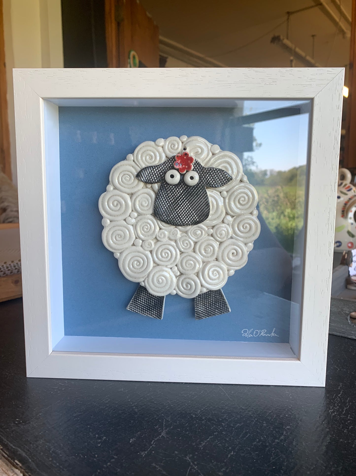 Large sheep with flower frame