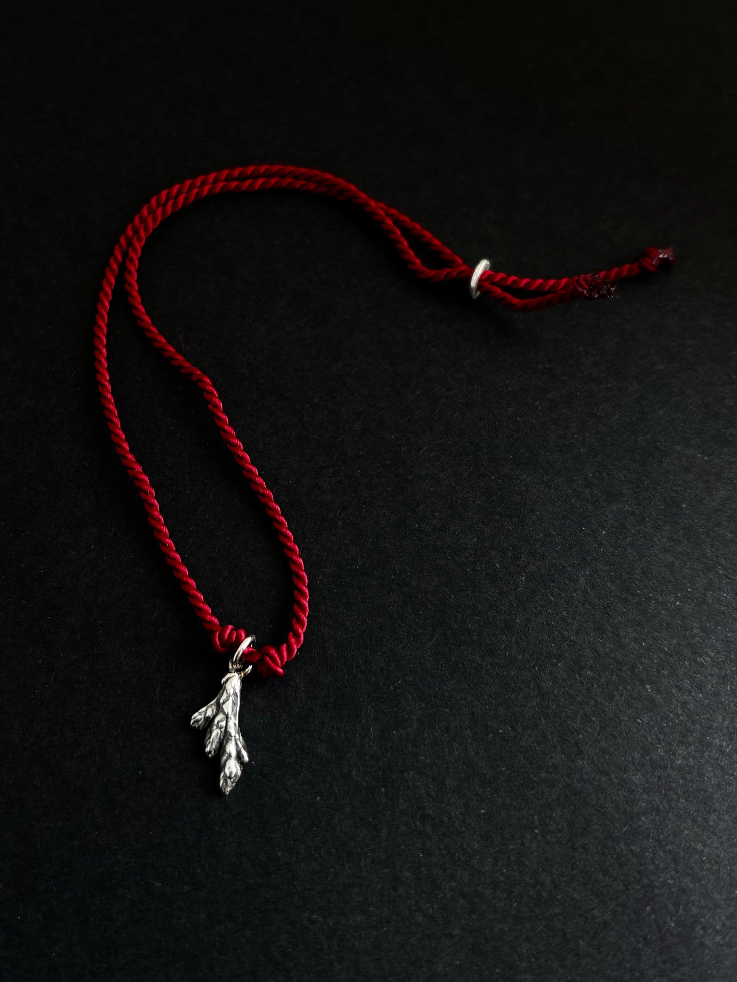 Red silk cord bracelet