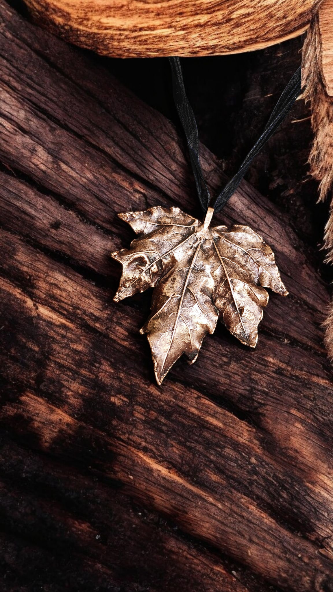 5. “Edge of Nature” – Copper Maple Leaf Pendant