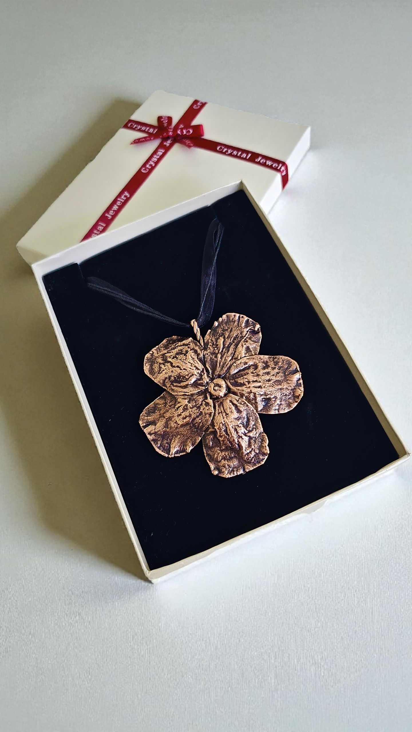 4. “Presence of Power” – Copper Pendant on Cord