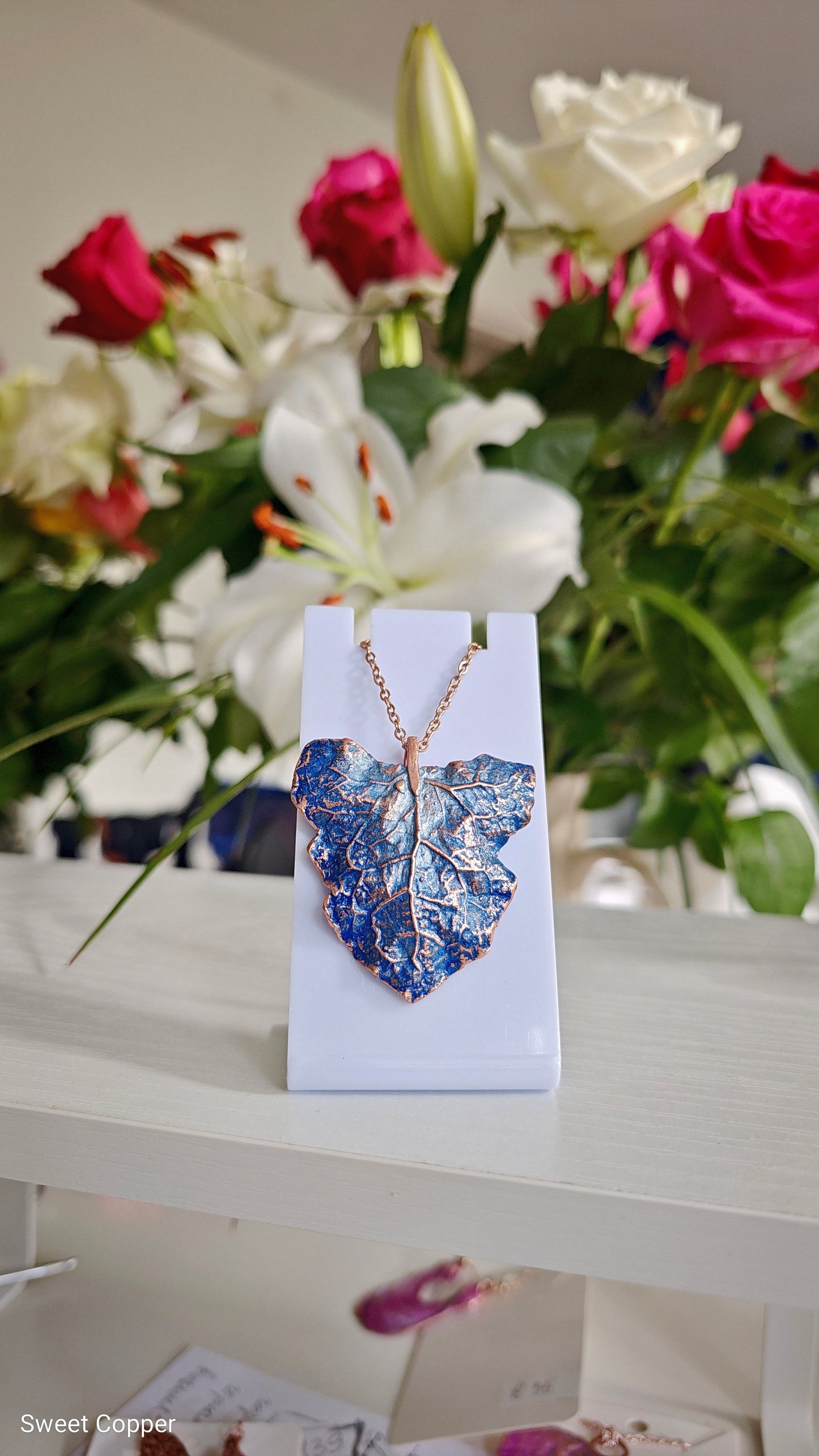 129 Coltsfoot Leaf Pendant — Blue Patina