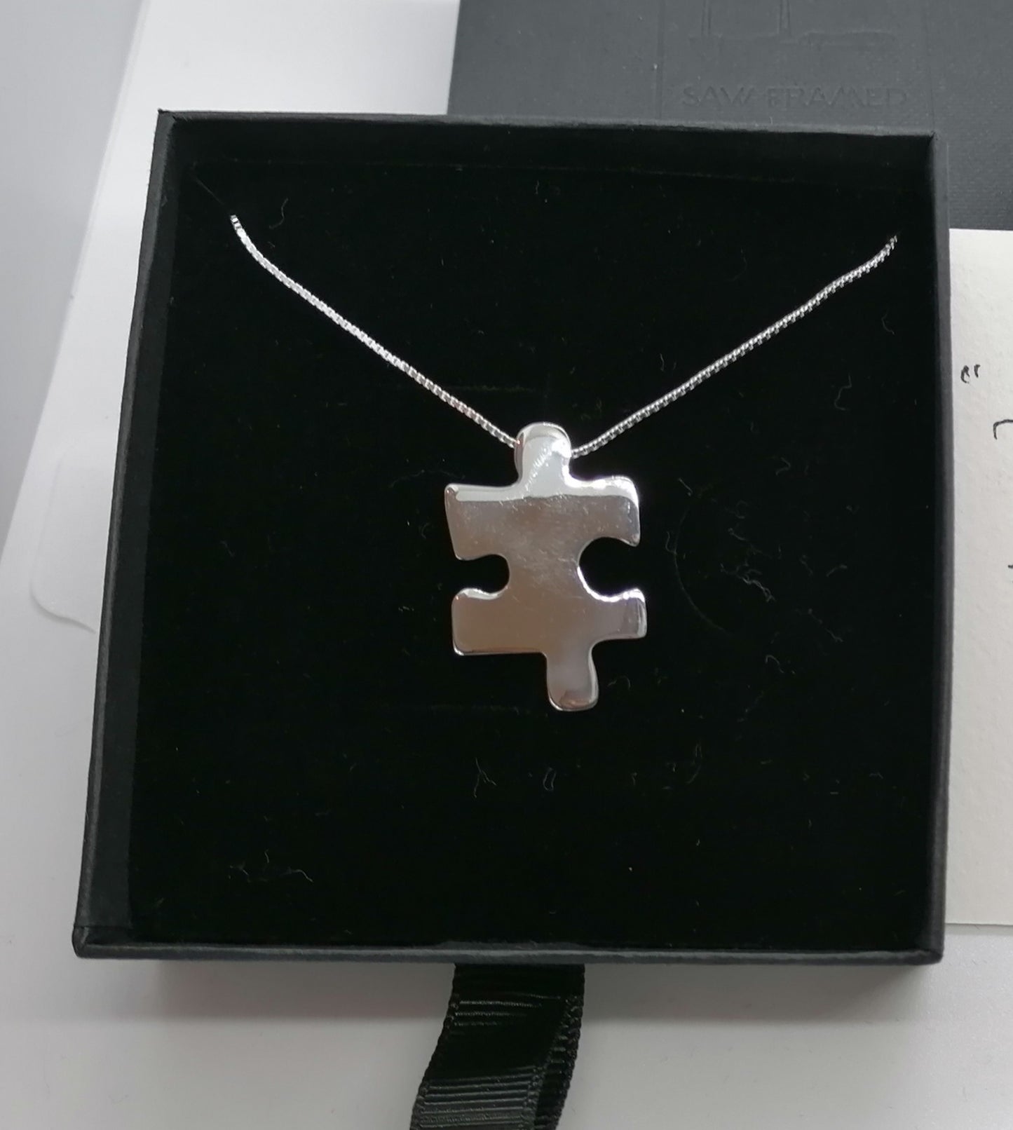 Sterling Silver Jigsaw Puzzle Necklace