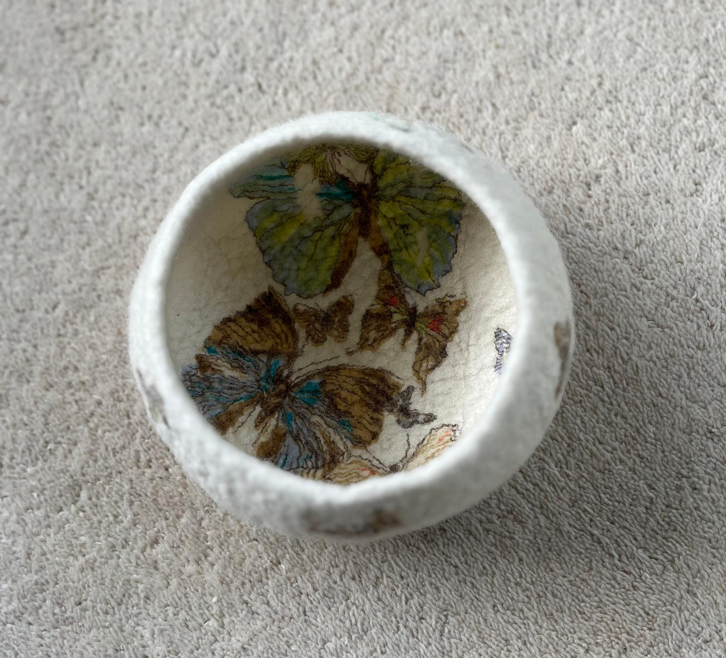 Felted bawl butterflies