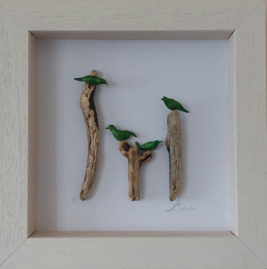 Family of Green Birds on Driftwood.