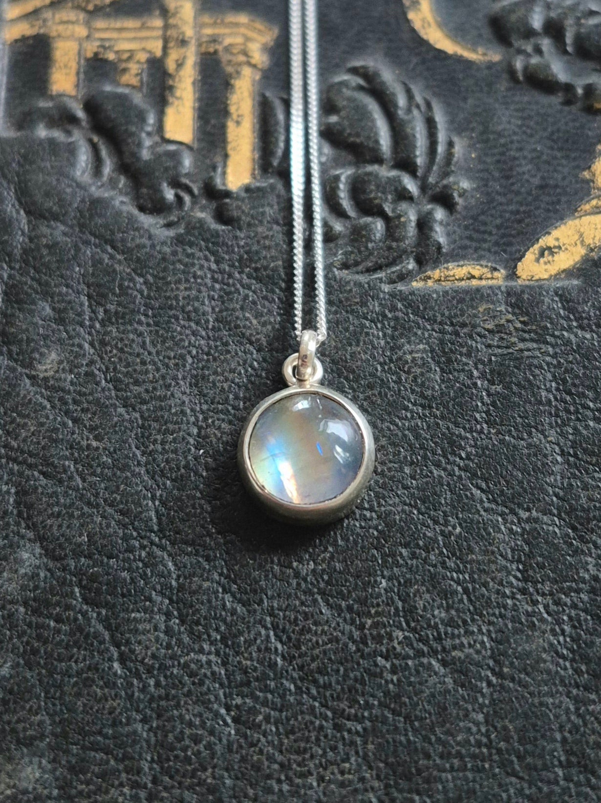 Small round moonstone pendant