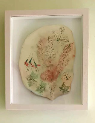 Box Framed Ceramic piece with florial design