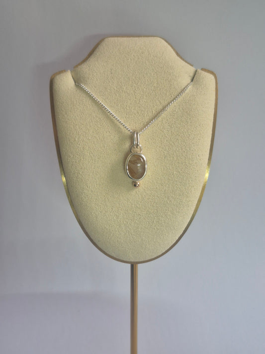 Rutilated quartz pendant in silver and 9k gold