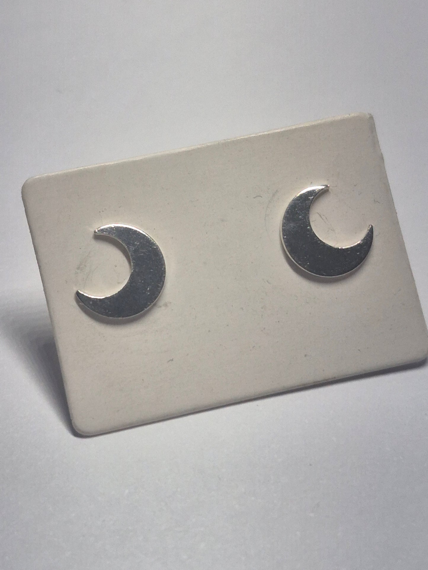Crescent moon studs