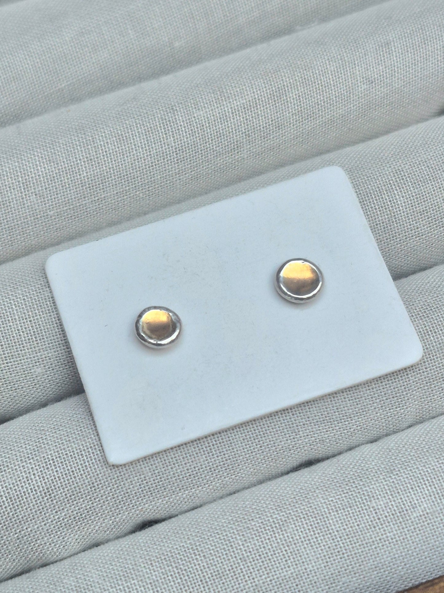 Gold and silver stud earrings