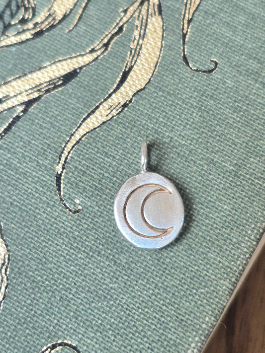 Crescent moon pendant