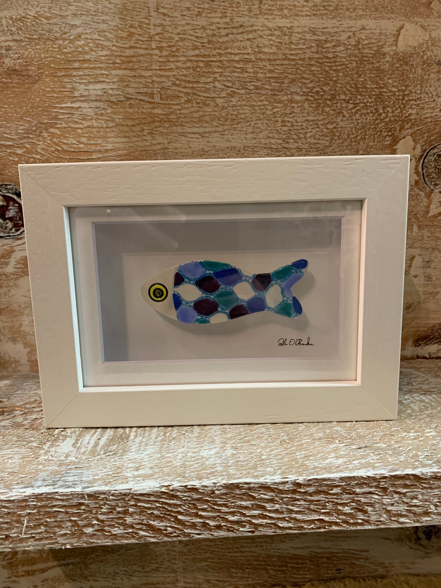 Framed ceramic fish