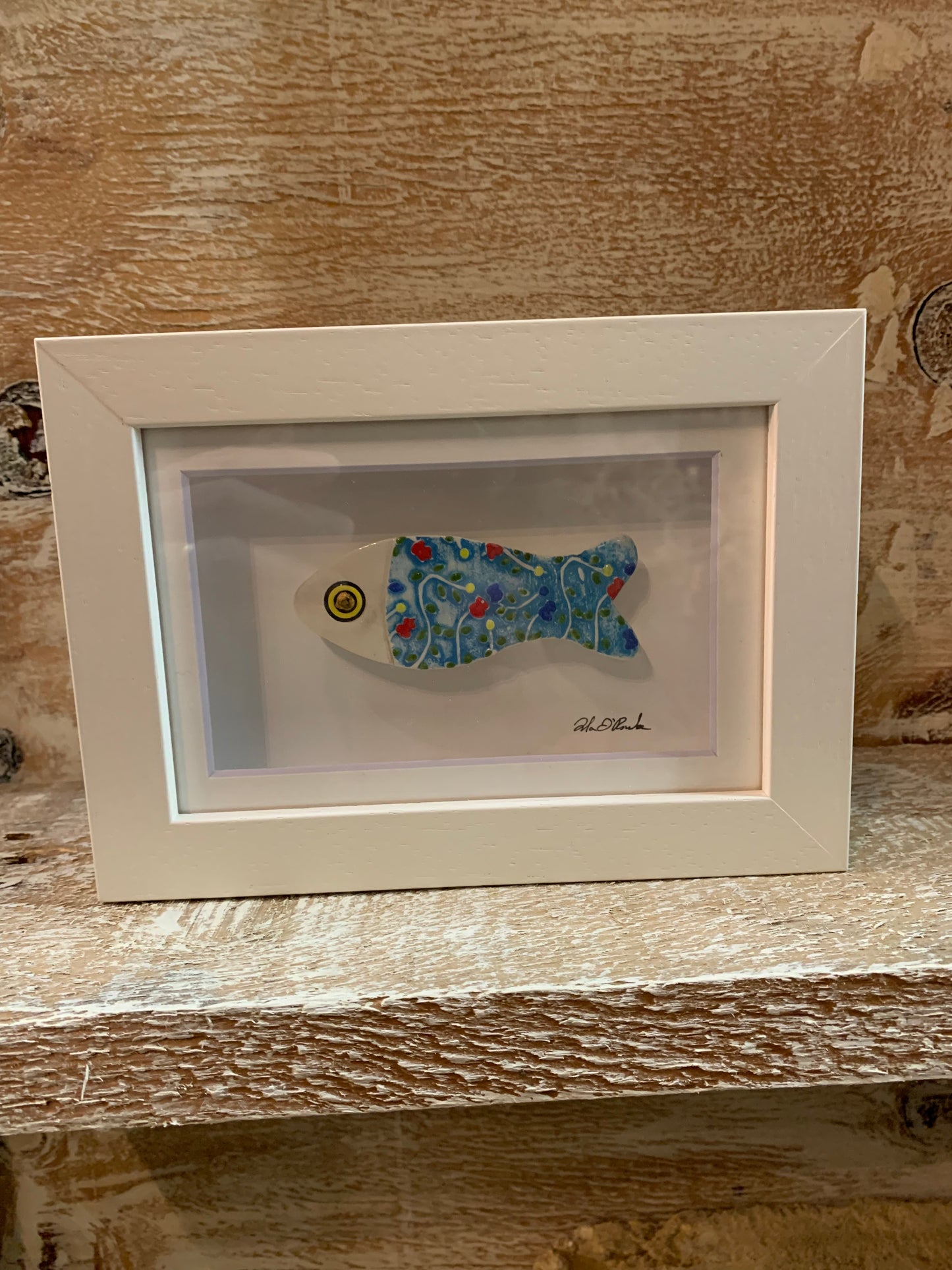 Framed ceramic fish