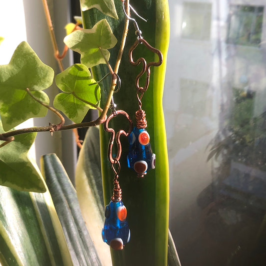 Copper earrings with blue glass drops