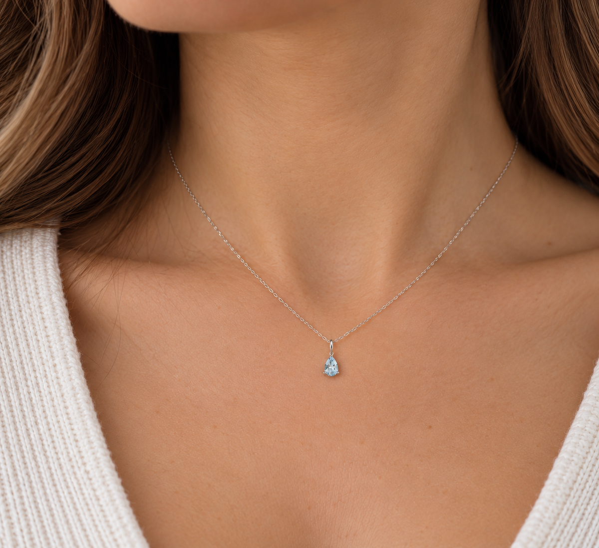 Crolyn pear shaped blue topaz pendant