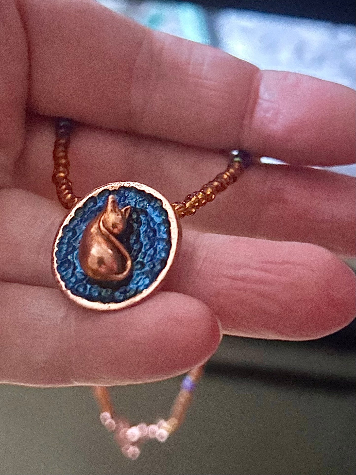 Sleeping kitty pendant necklace