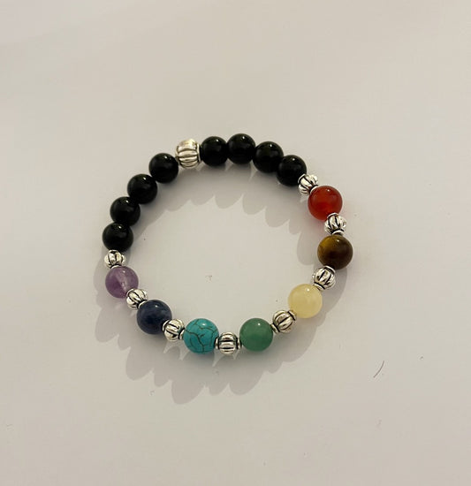 A Yoga Chakra Bracelet with Semi – Precious Stones