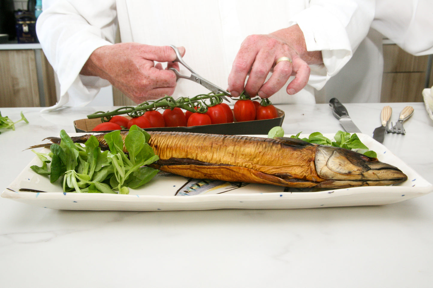 Rectangular Ceramic Platter hand painted with Mackerel Fish.  On the plate is a fish and some salads