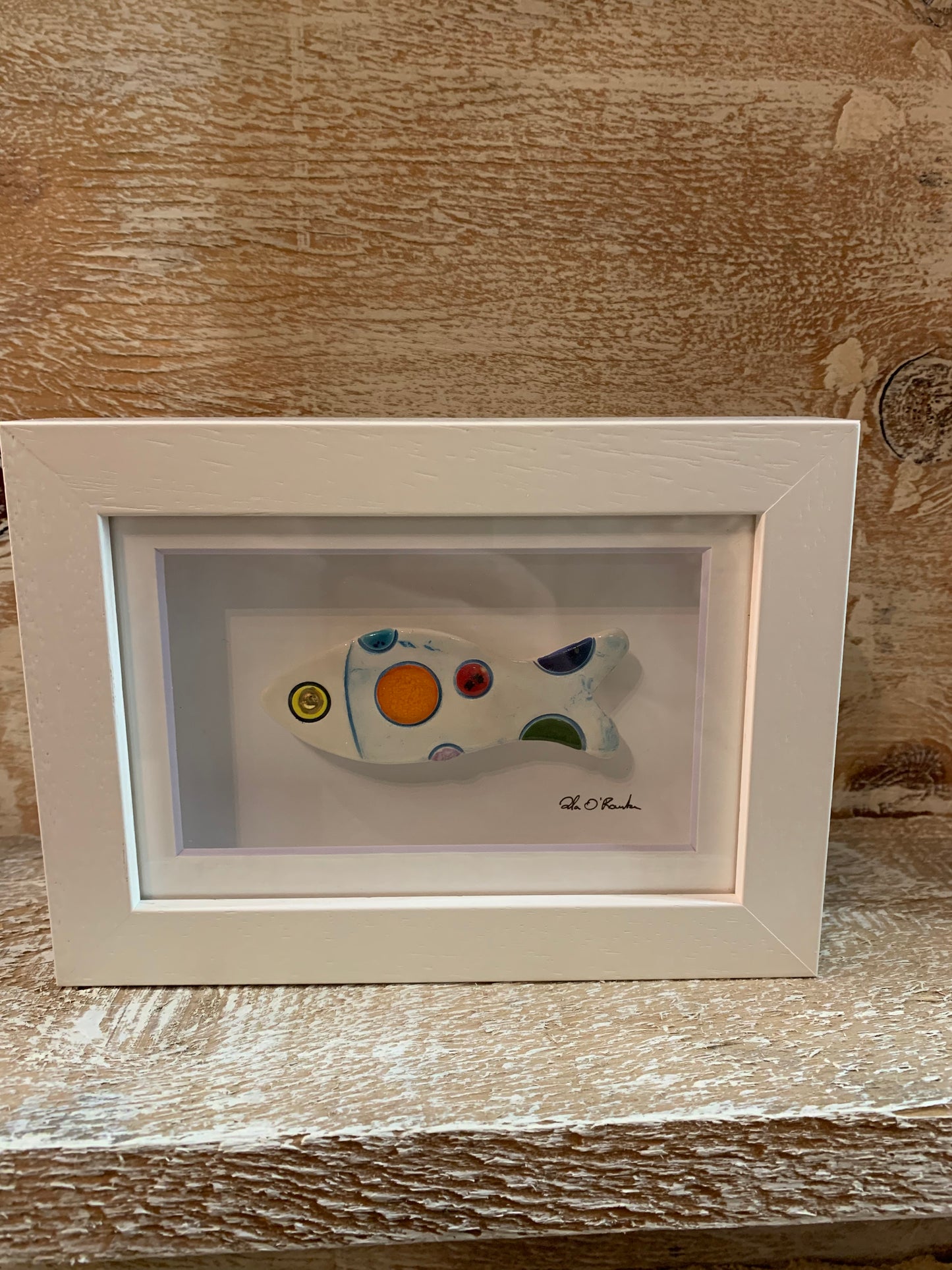 Framed ceramic fish