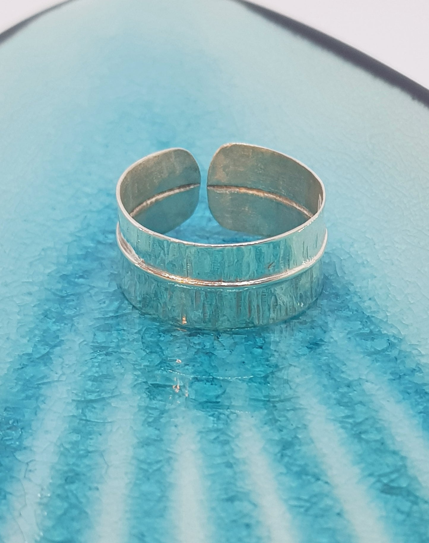 Folded expandable ring - textured