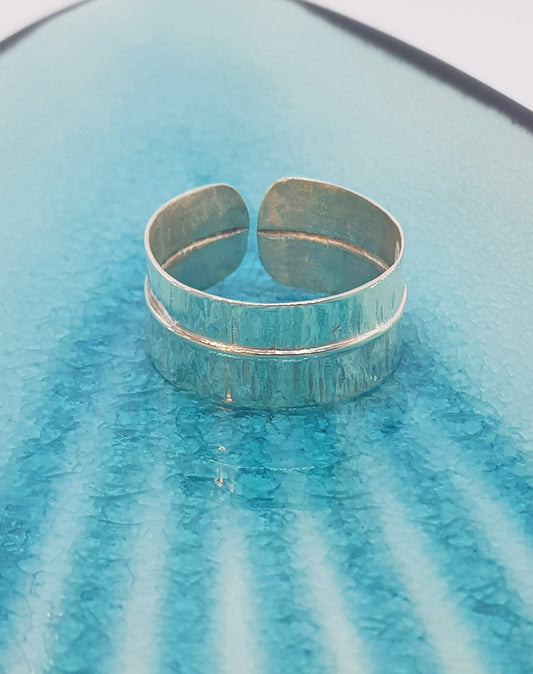 Folded expandable ring - textured