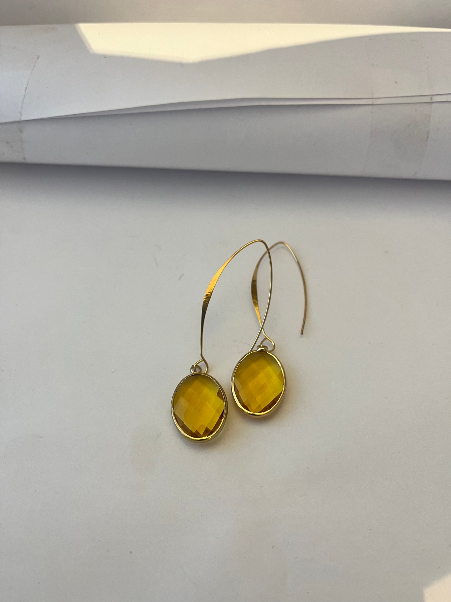 A Crystal Gold Plated drop earring