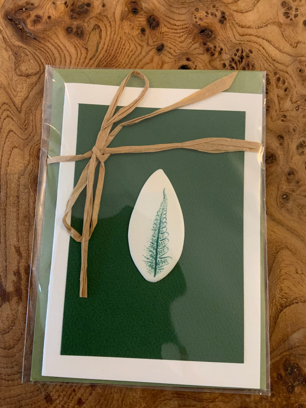 Card with ceramic