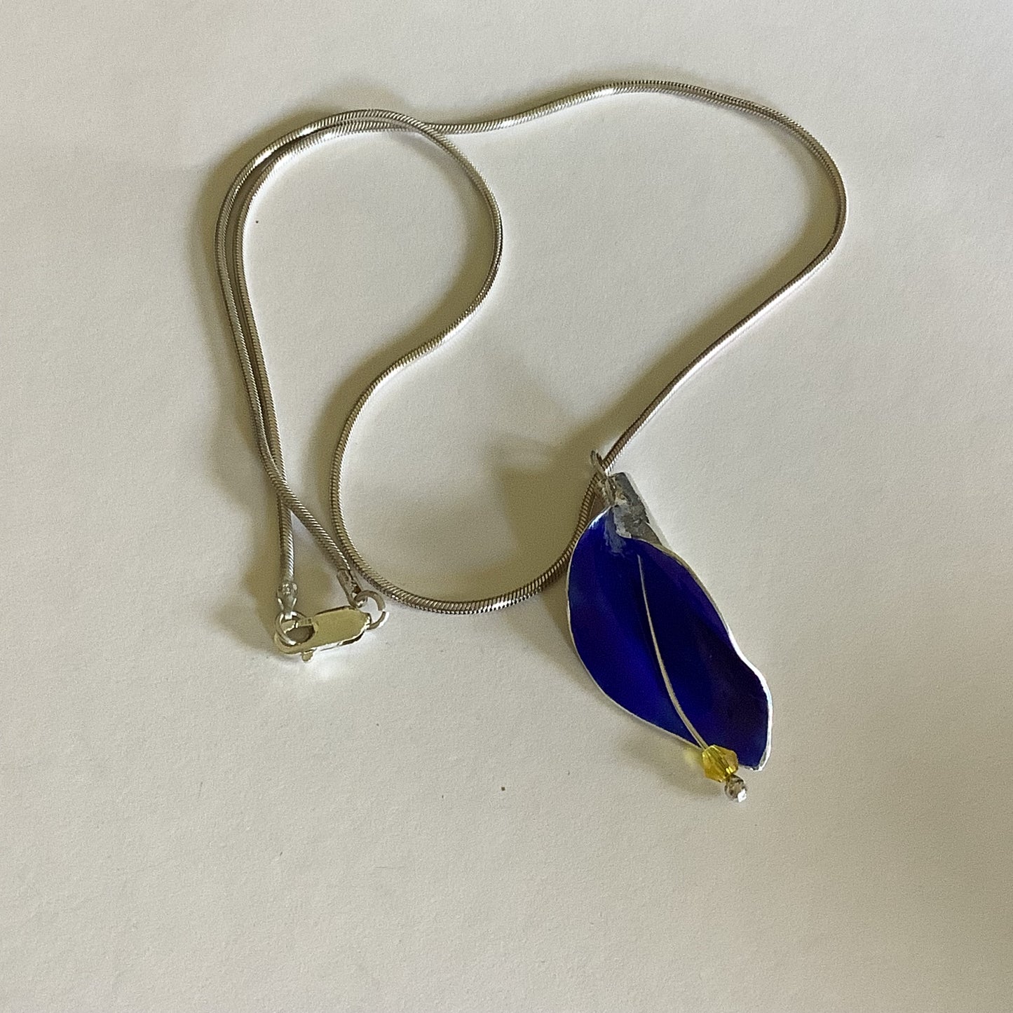 Deep blue silver and enamel lily pendant