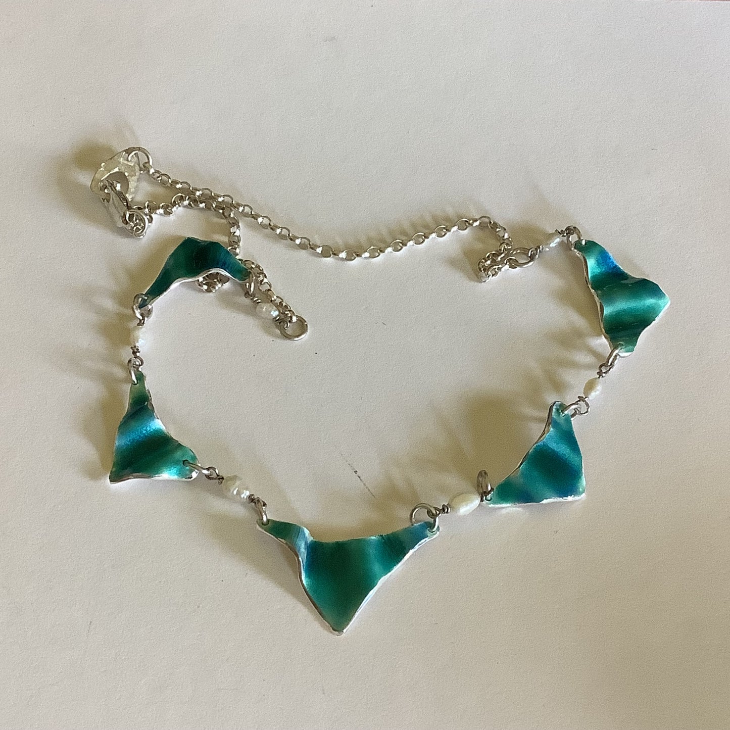 Sea green silver and enamel wave necklace