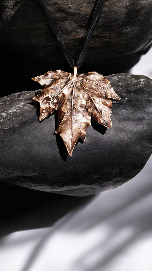 5. “Edge of Nature” – Copper Maple Leaf Pendant