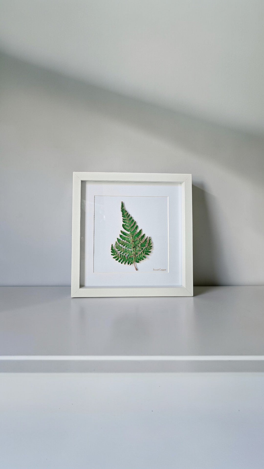 8. PIGS BACK. Emerald Radiance – Framed Copper Fern Interior Art