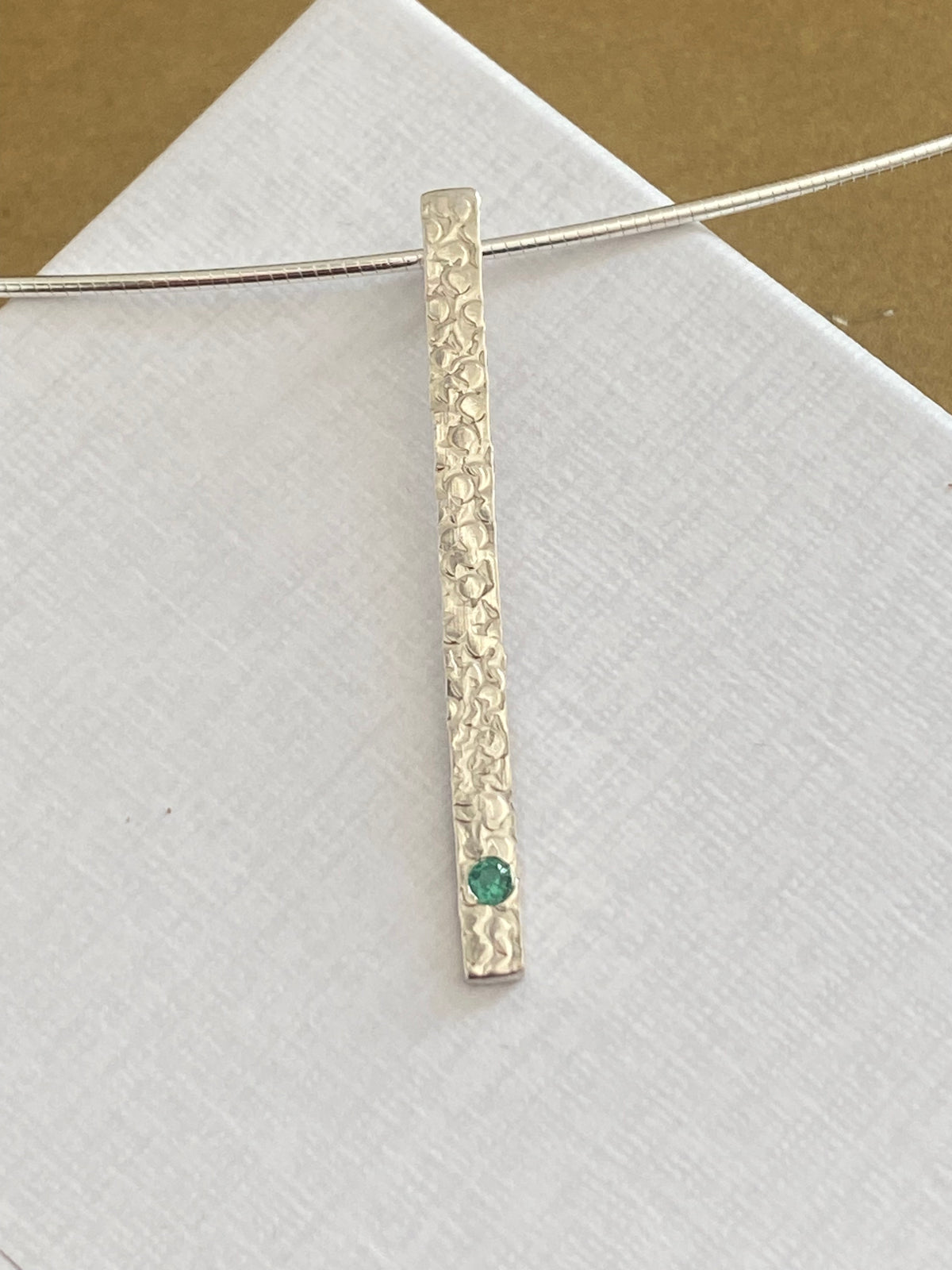 A Precious Emerald Stem Pendant