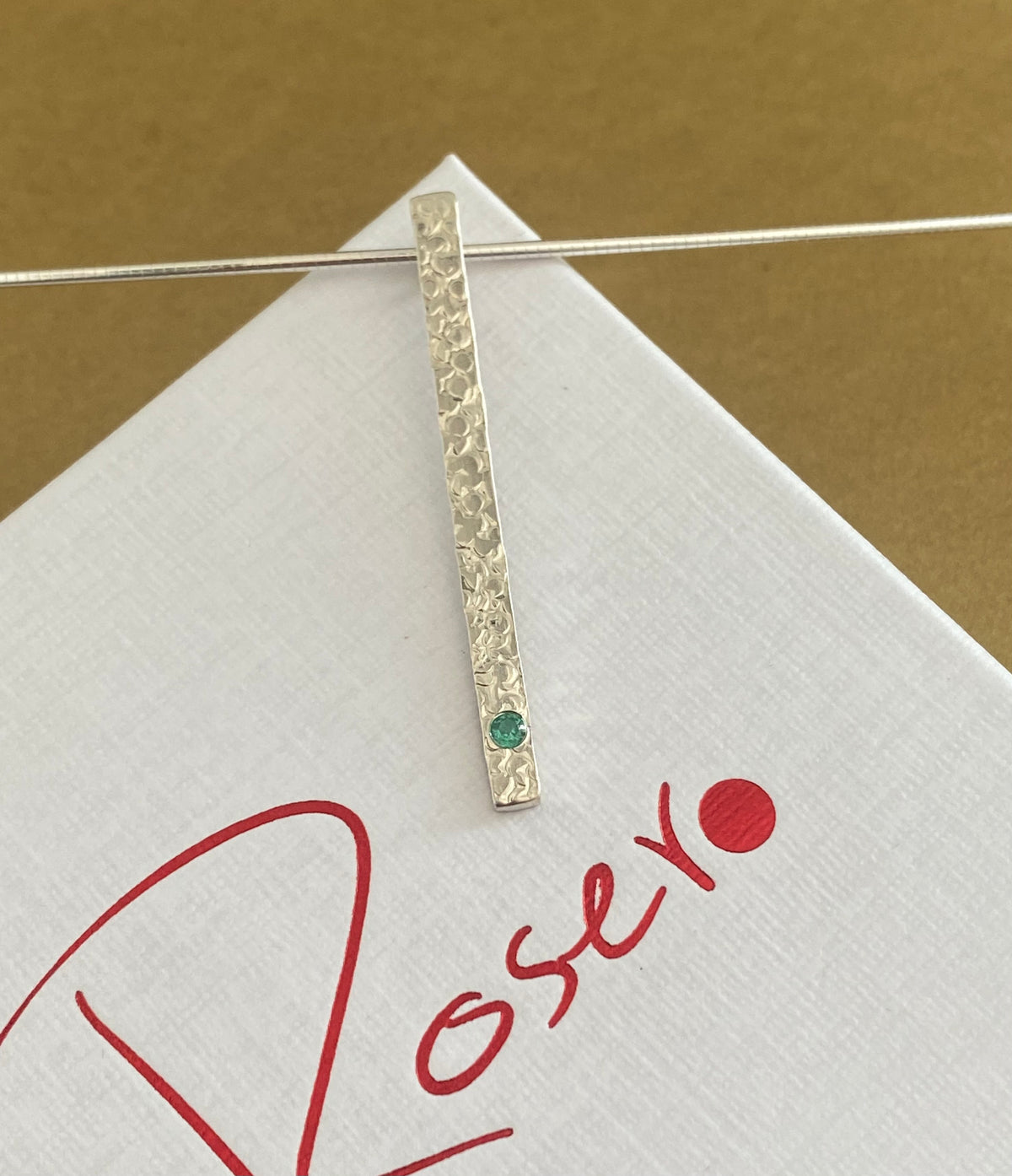 A Precious Emerald Stem Pendant