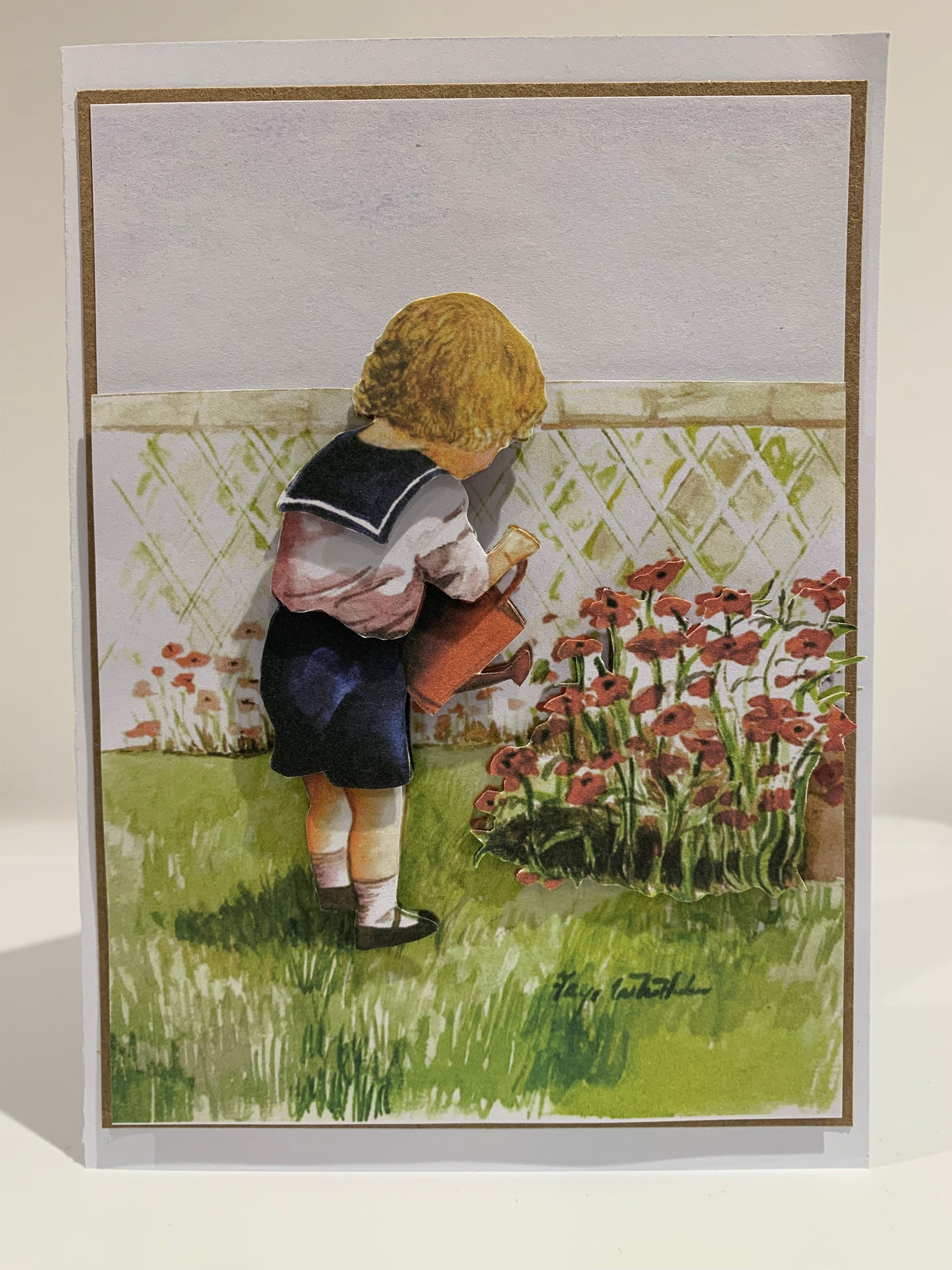 Boy watering flowers vintage card