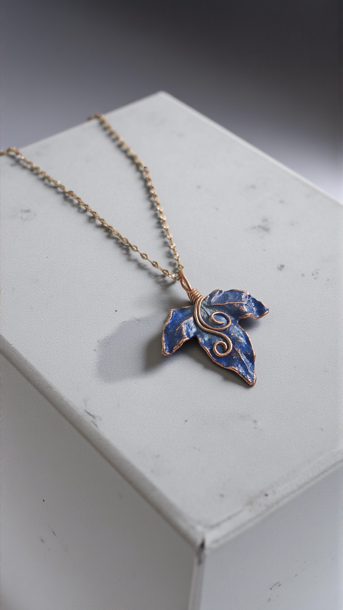 83 Copper Leaf Pendant with Spiral Detail