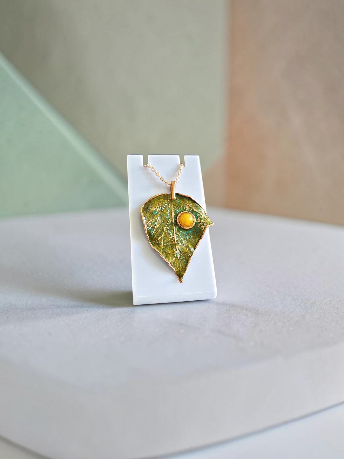 144. Ivy Leaf Pendant — Olive Patina & Yellow Howlite