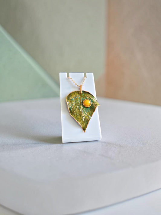 144. Ivy Leaf Pendant — Olive Patina & Yellow Howlite