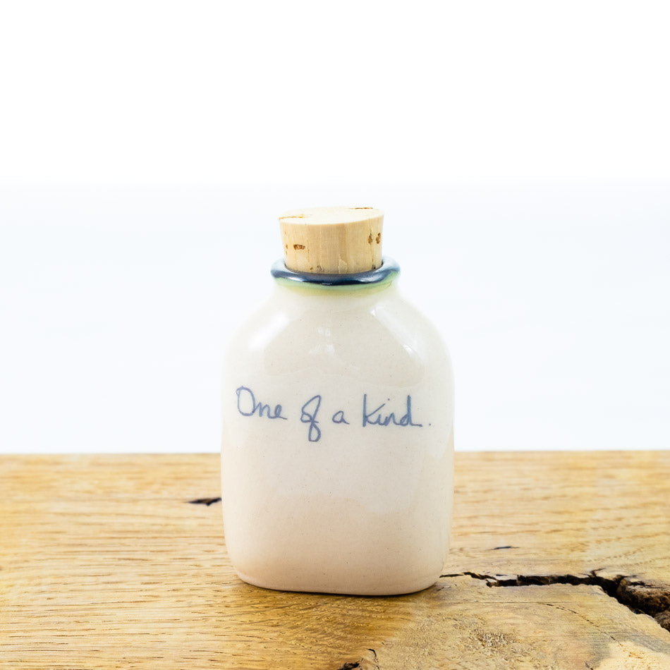 Message on a bottle : One of a kind + Green Heart (small)