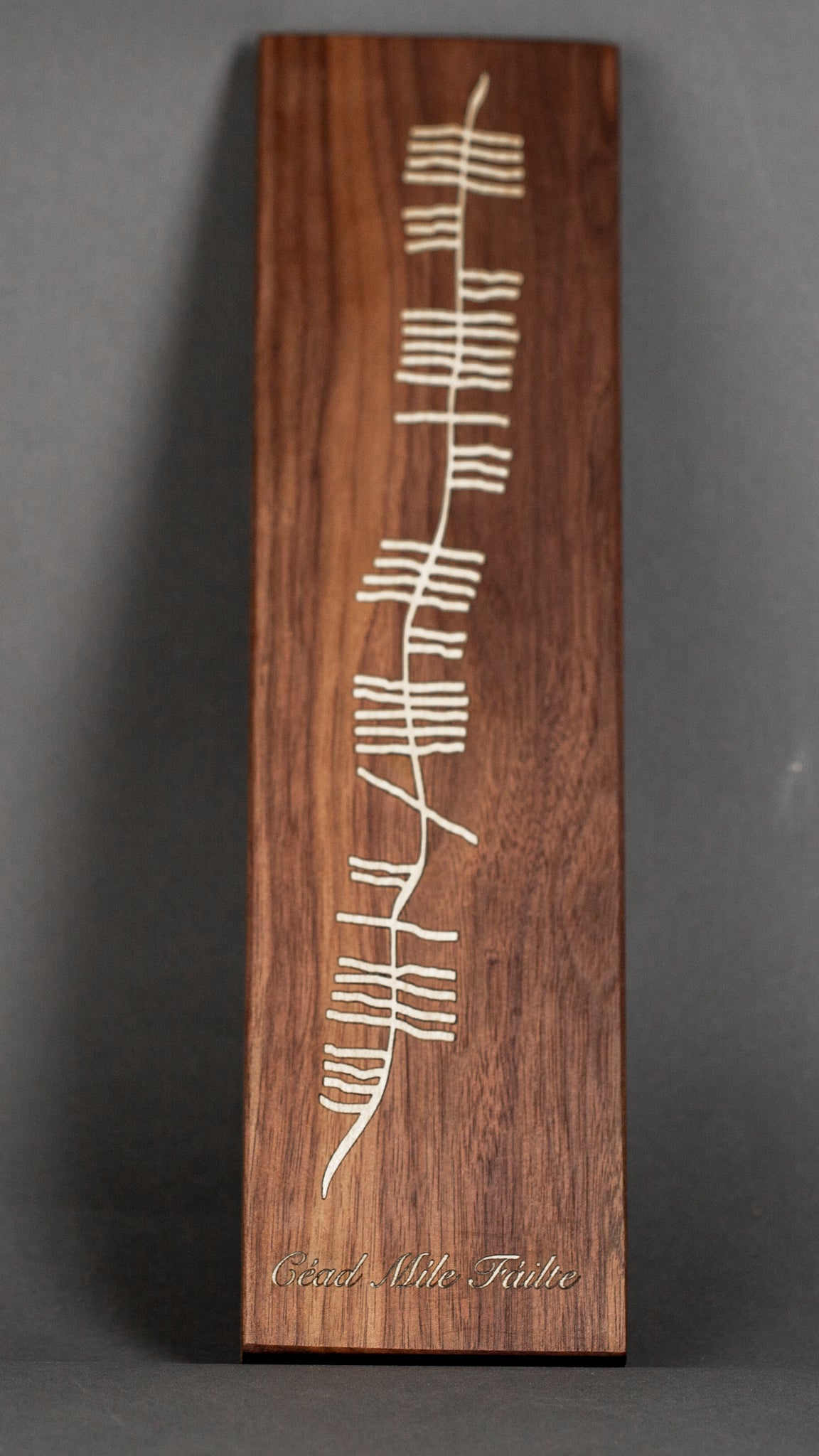 Céad Mile Fáilte - Ogham plaque Sycamore inlay in walnut